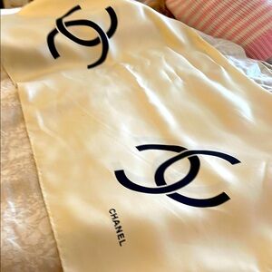 Chanel Cream Silk Scarf with Black Logo cannot recall where I bought this.